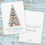 Christmas Tree Beach Mele Kalikimaka Holiday Card<br><div class="desc">Get into the holiday spirit with this unique Christmas card featuring a Christmas tree made entirely of stacked seashells, topped with a starfish in place of a traditional star. The soft watercolor design blends shades of teal and aqua blue with touches of light coral pink, tan, and white—creating a peaceful,...</div>