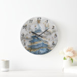 Christmas Tree Delight Large Clock<br><div class="desc">A beautifully designed clock adorned with a shimmering blue Christmas tree,  delicate golden accents,  and a whimsical reindeer. Set against a marbled background,  this festive décor captures the spirit of the holiday season,  evoking joy and cheer.</div>