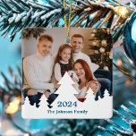 Christmas Tree Overlay Family Photo Custom 2024 Ceramic Ornament<br><div class="desc">This chic, modern family photo double sided Christmas ornament features your annual holiday photograph framed by a bottom border of white Christmas trees silhouette. Personalise with blue script of the year on the front and your name for a beautiful minimalist photograph Christmas gift with a 2nd photograph on the back....</div>