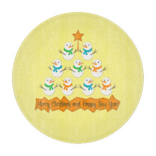 Christmas tree pyramid made of xmas snowmen cutting board
