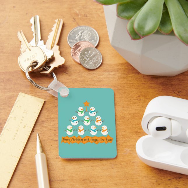 Christmas tree pyramid made of xmas snowmen key ring (Desk)