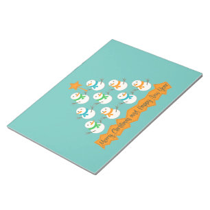 Christmas tree pyramid made of xmas snowmen notepad