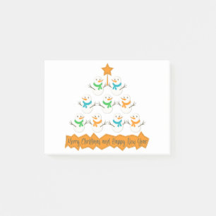 Christmas tree pyramid made of xmas snowmen post-it notes