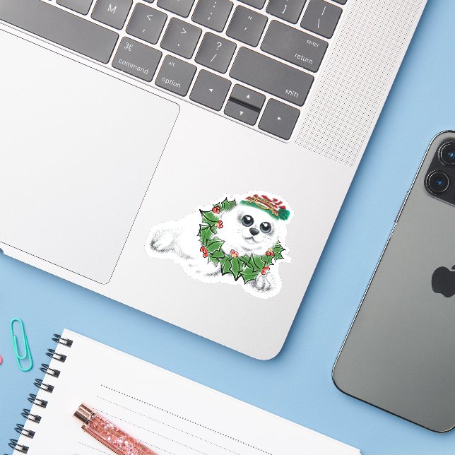 Christmas white seal pup, festive Arctic animal    (Laptop w/ iPhone)