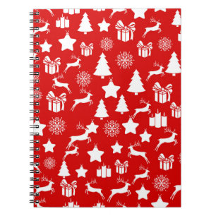 Christmas white snowflake on abstract red bakcgrou notebook