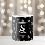 Christmas white snowflakes black monogram coffee mug<br><div class="desc">Modern vector pattern of white snowflakes on black background feature on this festive mug.  This winter themed design also features a monogram that can be personalised with your own initial and name.</div>