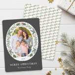 Christmas Winter Greenery Oval Photo Holiday Card<br><div class="desc">This festive Christmas holiday card showcases an oval photo framed with winter greenery and red berries on a dark slate grey background. Personalise this modern elegant holiday card by adding your photo and family name.</div>