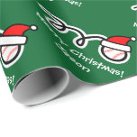 Christmas wrapping paper with Santa hat baseball<br><div class="desc">Merry Christmas wrapping paper with Santa hat baseball. Cute Holiday design for players and fans. Funny Xmas gift wrap for men,  women and kids (boys and girls). Personalizable with custom name and greeting. Green and red colours. Background colour is customisable.</div>