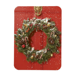 Christmas wreath hanging on a door magnet