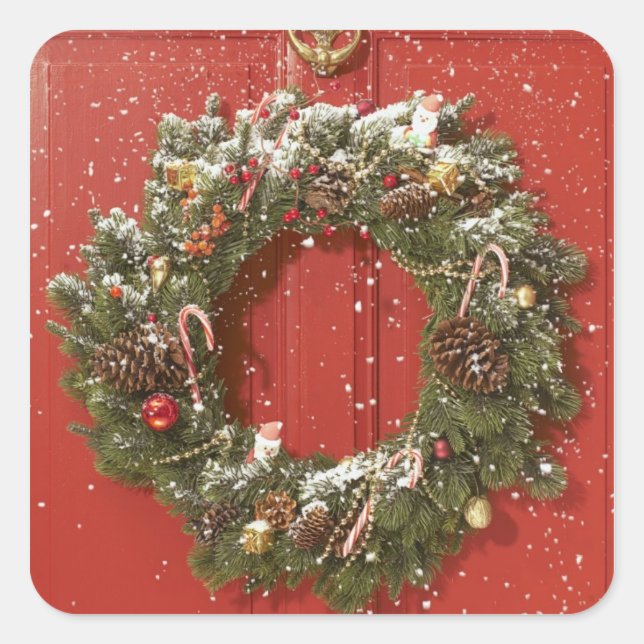 Christmas wreath hanging on a door square sticker (Front)