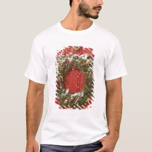 Christmas wreath hanging on a door T-Shirt