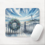 Christmas Wreath On a Beach Fence Mouse Mat<br><div class="desc">A wreath decorated with seashells and greenery adorns a wooden fence,  while a lighthouse stands near the ocean under a sky filled with dramatic clouds and soaring seagulls</div>