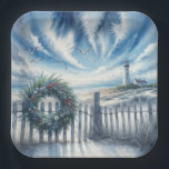 Christmas Wreath On a Beach Fence Paper Plate<br><div class="desc">A wreath decorated with seashells and greenery adorns a wooden fence,  while a lighthouse stands near the ocean under a sky filled with dramatic clouds and soaring seagulls</div>