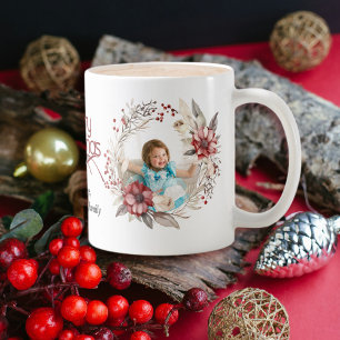 Christmas wreath, red flower and berries photo coffee mug