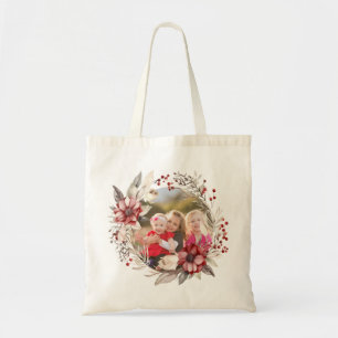 Christmas wreath, red flowers and berries photo tote bag