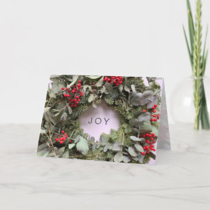 Christmas wreath with eucalyptus and red berries holiday card
