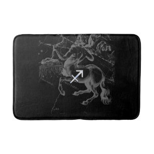 Chrome Like Sagittarius Sign on Black Hevelius Bath Mat