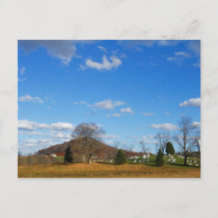 Church and Cemetery Under a Blue Sky Postcard