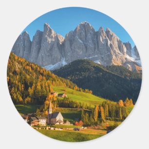 Church and village with mountains landscape classic round sticker