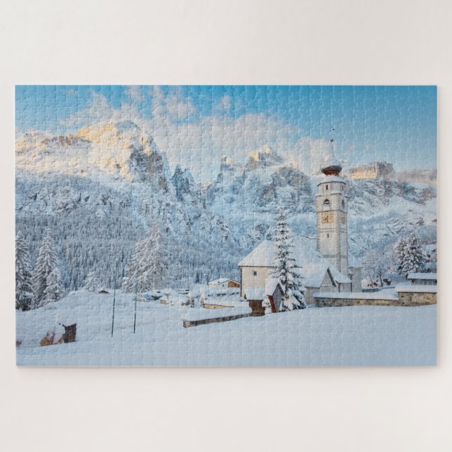 Church covered in snow with mountain background jigsaw puzzle (Horizontal)