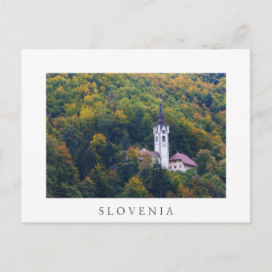 Church in a fall forest in Slovenia Postcard