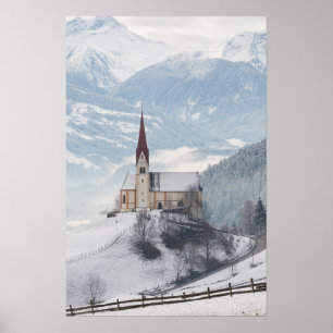 Church in an alpine winter landscape poster