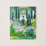 Church in Cassone Gustav Klimt Jigsaw Puzzle<br><div class="desc">Puzzle featuring Gustav Klimt’s oil painting Church in Cassone (1913). A beautiful Italian church is surrounded with green trees on the shore of blue waters. A marvellous gift for Art Nouveau lovers and Austrian art enthusiasts!</div>