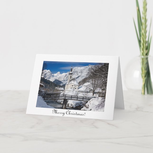 Church in the snow with Alps mountains Christmas Card (Front)