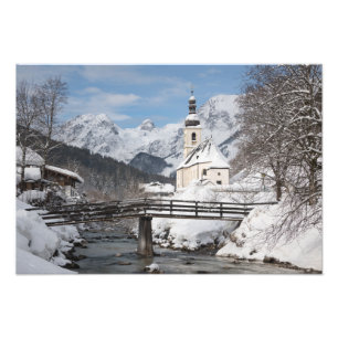 Church in the snow with Alps mountains in winter Photo Print