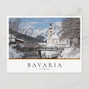 Church in the snow with Alps mountains in winter Postcard
