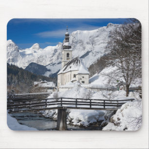 Church in the snow with Alps mountains Mouse Mat