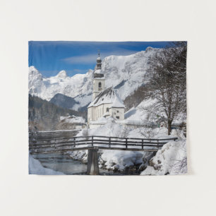 Church in the snow with Alps mountains Tapestry