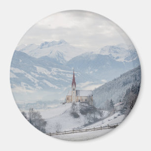 Church in Zillertal in winter round magnet