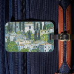 Church (Kirche) in Cassone by Gustav Klimt Luggage Tag<br><div class="desc">Church in Cassone - Landscape with Cypresses (aka Kirche in Cassone - Landschaft mit Zypressen) (1913) by Gustav Klimt is a vintage Victorian Era Symbolism fine art painting featuring a church in the town of Cassone with surrounding stone buildings and cypress trees on the edge of Lake Garda in Italy....</div>