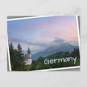 Church with Alps mountains at sunset Postcard