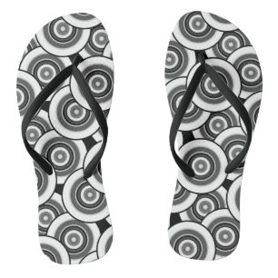 Circles and rings geometric black and white patter flip flops
