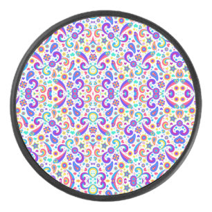 Circular item with a vibrant, symmetrical purple hockey puck