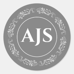 Circular monogram design in grey and white. classic round sticker