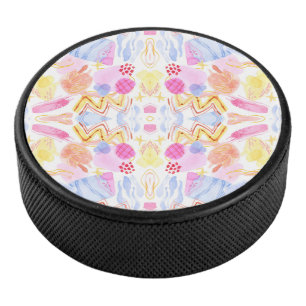 Circular object featuring a colorful abstract  hockey puck