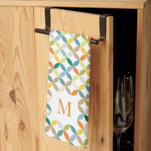 Circular quartered pattern warm tone monogram tea towel