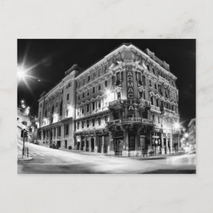 City light and buildings by night postcard
