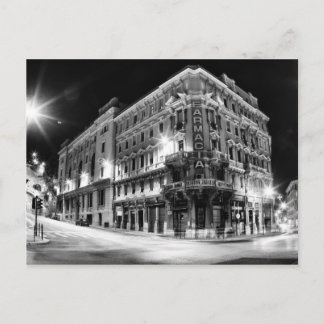 City light and buildings by night postcard