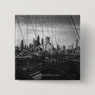 Cityscape through bridge cables 15 cm square badge