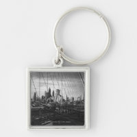 Cityscape through bridge cables