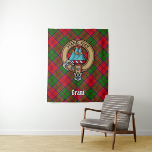 Clan Grant Crest over Tartan Tapestry
