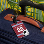 Claret and Blue Stripes Jersey Soccer Ball Luggage Tag<br><div class="desc">Perfect for the soccer fan or soccer player whose team colours are claret and blue, with a football jersey style design in claret with blue and white stripes and customisable text for their name and number. A soccer ball is also featured as part of the design. Would you like this...</div>