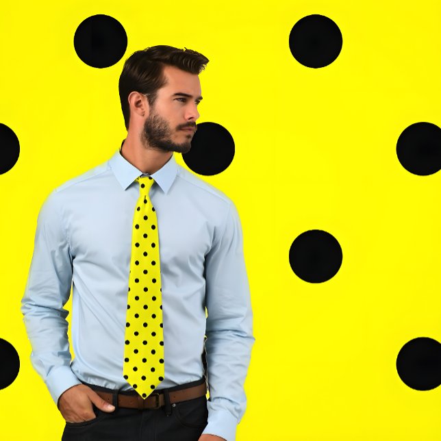 Classic Black Polka Dot Pattern on Yellow Tie (Man wears a Classic Black Polka Dot Pattern on Yellow Tie. Background matches tie pattern.)