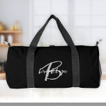 Classic Black White Grey Script Monogram  Duffle Bag<br><div class="desc">This personalised duffel bag features a monogram and first name in modern grey and white script on a classic black background.</div>
