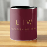Classic Burgundy Gold Minimalist Monogram Two-Tone Coffee Mug<br><div class="desc">Sip in style with this classic burgundy gold minimalist monogram two-tone coffee mug. Featuring a rich burgundy background, elegant gold typography, and a sleek modern layout, this personalised mug blends timeless luxury with everyday functionality. Perfect as a wedding gift, anniversary present, holiday gift, or corporate keepsake, this mug can be...</div>