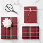 Classic Christmas red plaid festive stars holiday Wrapping Paper Sheet<br><div class="desc">A bold modern take on a classic holiday plaid makes this wrapping paper set perfect way for both traditional and unconventional gift givers. The classic deep red with checks of gold, blue, green and white is chic and stylish. Also includes a coordinating sheet dotted with stars. Will look fantastic on...</div>
